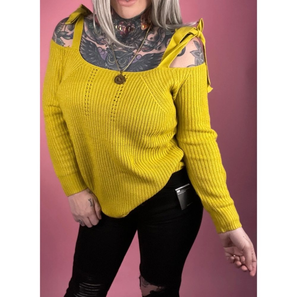 mustard yellow off-the-shoulder knit top